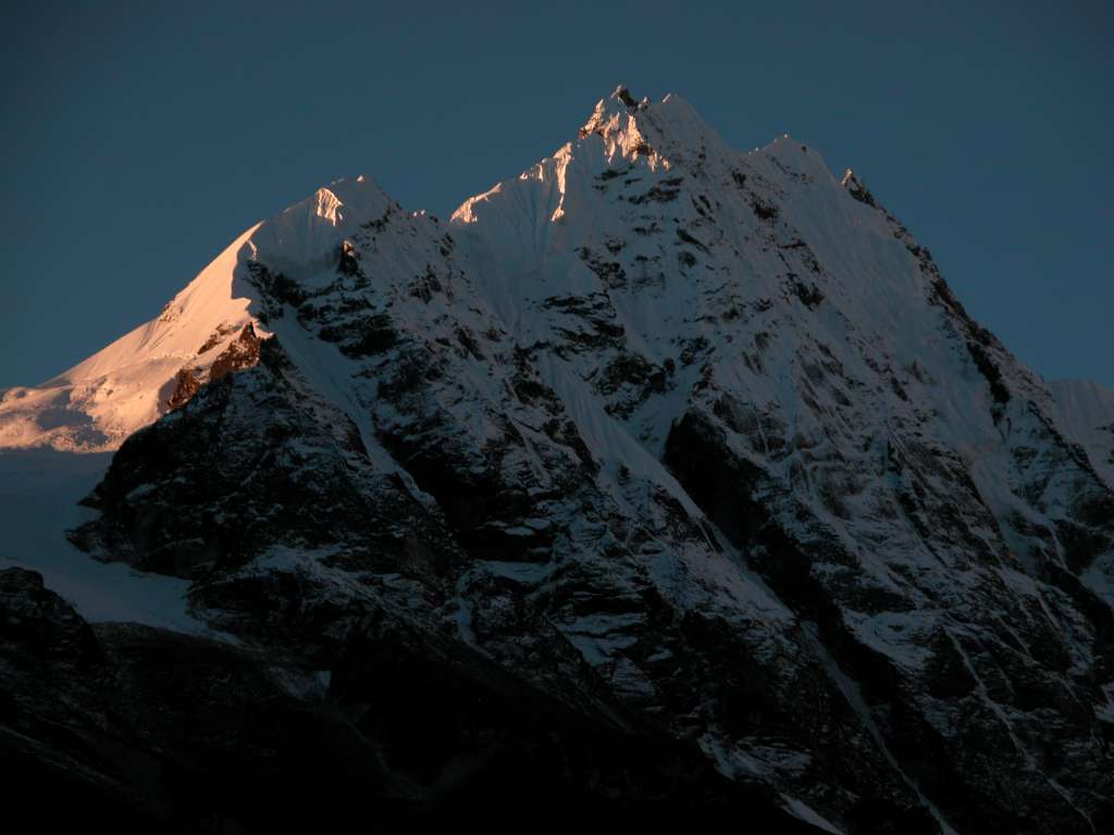 Manaslu 07 05 Simnang Himal From Syala This cirque of mountains from Syala, although slightly lower, rivals the Everest Kangshung east face and the Annapurna Sanctuary. The first mountain on the left is Simnang Himal (6251m), which was climbed for the first time on May 16, 2001 by Ukranians Mistislav Gorbenko, Vadim Leontiev, Sergei Pugachov, and Mykhaylo Zagirnyak.